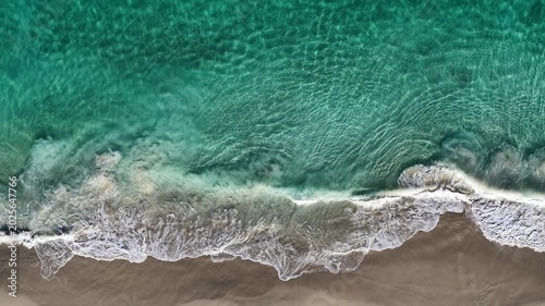Drone view of crystal clear water and sand, Alkimos Beach, Perth