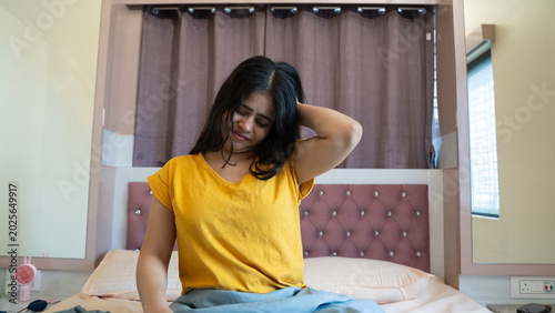 Photos Indian Woman Yawning After Waking Up Sitting on Bed in Morning at Home