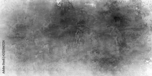 Obraz na płótnie A dark and gritty black and white grunge background featuring a rough textured v