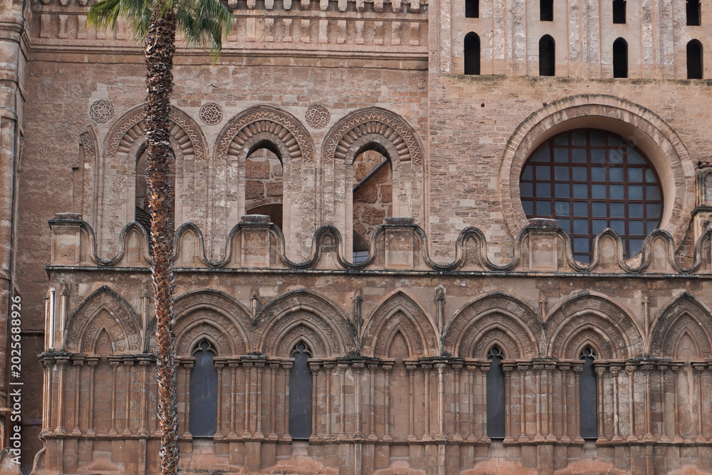 Obraz premium Palermo Cathedral in sunny day, Sicily, Italy. Cathedral of Palermo dedicated to the Assumption of the Virgin Mary. Popular touristic and travel landmark. Holidays in Italy. Sightseeing.