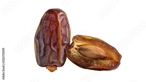 Quadro su tela Whole and halved Medjool date with visible seed, isolated on transparent backgro