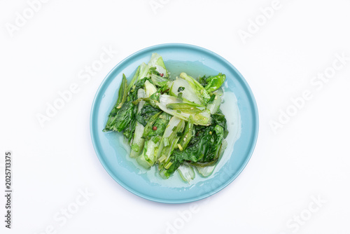The stir-fried green cabbage on the plate