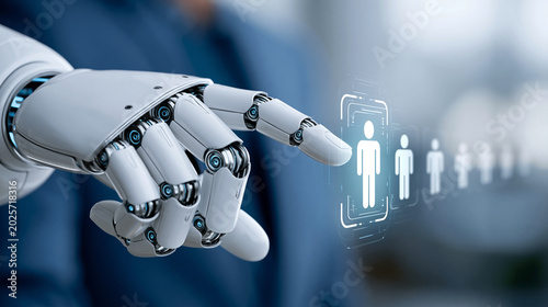 Φωτογραφία Close-up of a robotic hand selecting a highlighted human profile from a row of d