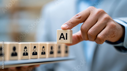 фотографія Close-up of a businessman selecting an AI cube from a row of employee blocks sym
