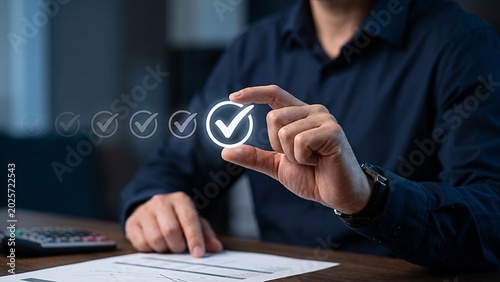 Close-up of a person holding a glowing checkmark icon, symbolizing success, approval, and completion of tasks