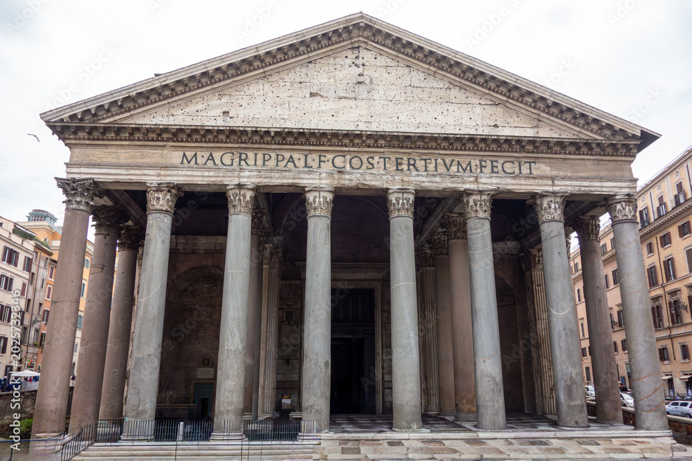 Obraz premium The iconic facade of the Pantheon in Rome, Italy. A famous ancient Roman temple with magnificent Corinthian columns, a major historic landmark and popular European travel destination.