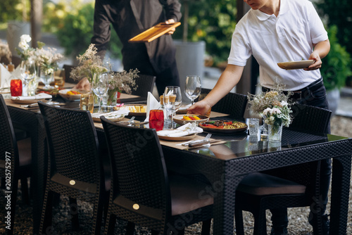 Relaxed outdoor dining with attentive staff and communal
