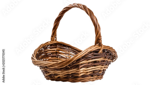 Fotografie Woven wicker basket with twisted handle, isolated on transparent background