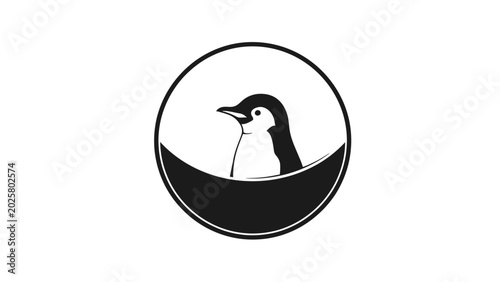 Obraz na płótnie Minimalist black and white logo featuring a penguin's head within a circle