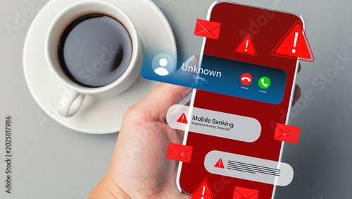 Fotografie Scam call and message alert shown on a smartphone with a cup of coffee nearby