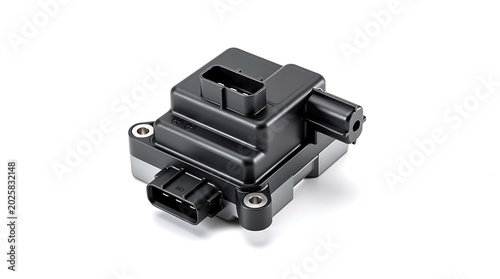 Black plastic automotive ignition coil pack isolated on white backgrou