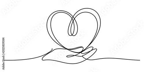 Fotografie Hand holding a heart shape with one continuous line drawing