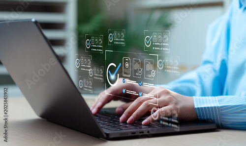 Quadro su tela Businesswoman taking assessment with digital checklist and questionnaire, completing survey tasks, business evaluation, technology workflow and productivity concept