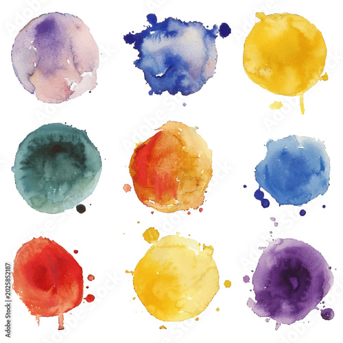 Set of nine circular watercolor blots in various soft and vibrant hues, ideal for creative backgrounds, textures, and artistic designs.