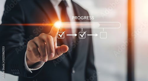 Business professional interacting with a digital progress bar interface signifying completion and achievement