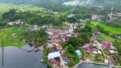 Drone Footage of Preserved Batak Toba Cultural Village on Samosir Island, Lake Toba, Indonesia — Traditional Rooftops from Above