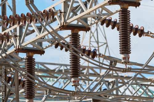 Tableau sur toile Close-up of ceramic insulators and steel support structures inside electrical substation