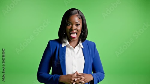 Woman Speaking and Gesturing Against Green Screen Background