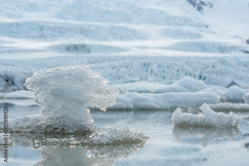 Glacier lagoon with icebergs floating at the foot of the Vatnajokull Glacier or Vatna Glacier, the largest and most voluminous ice cap in Iceland, and the second largest in area in Europe