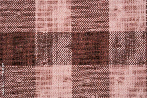 Brown and pink checkered linen fabric texture