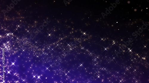 Golden glitter particles dust powder shining stars abstract blue background