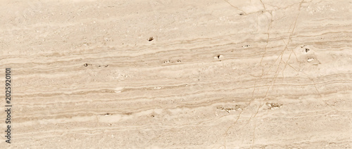 Fotografía Travertine marble background shows a polished beige limestone surface with natur