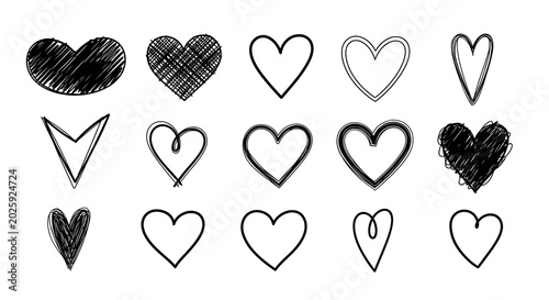 Set of hand-drawn heart shapes and symbols with valentine scribble vignette collection symbolic