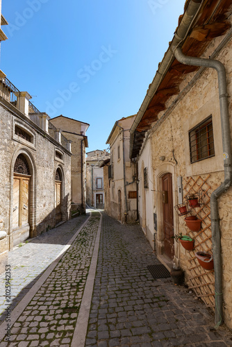 A street among the houses of Calascio, a small town in Abruzzo, Italy.