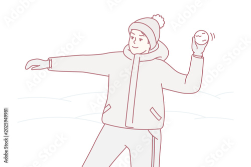 Tableau sur toile Teenage boy in winter clothes and hat plays snowballs throws snow at friends