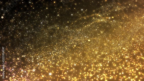 Golden glitter particles dust powder shining stars abstract background
