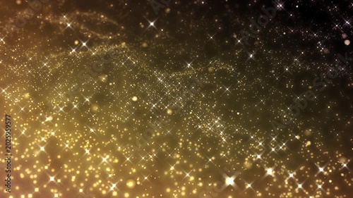 Golden glitter particles dust powder shining stars abstract background