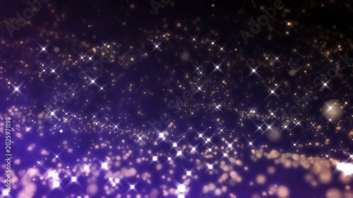 Golden glitter particles dust powder shining stars abstract blue background