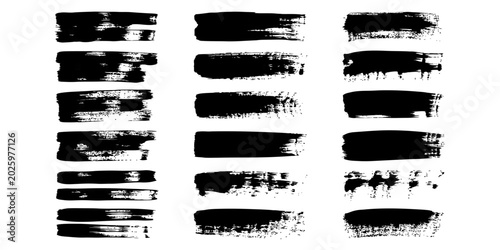 Cuadro en lienzo Set of black ink paint brush strokes and grunge texture lines for artistic desig