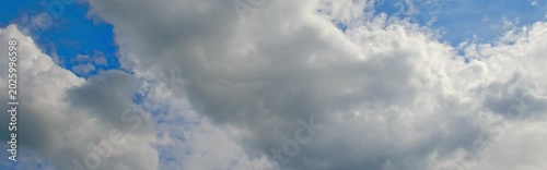 Anamorphic timelapse: clouds on sky in springtime