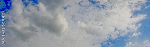 Anamorphic timelapse: clouds on sky in springtime