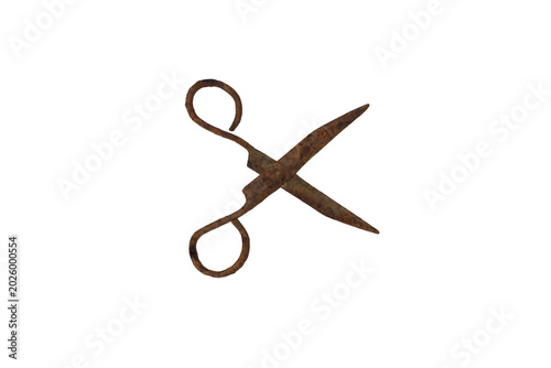 Antique rusty scissors isolated on a white background, showing signs of age and wear