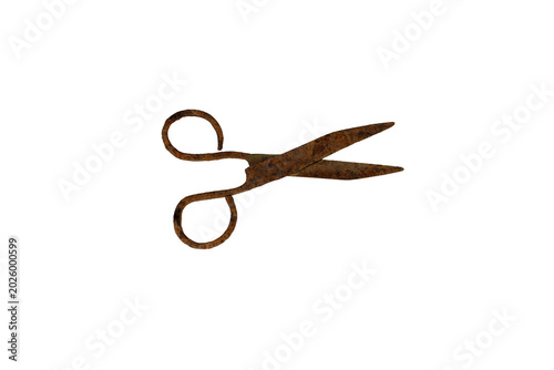 Antique rusty scissors isolated on a white background, showing signs of age and wear