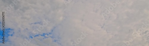 Anamorphic timelapse: clouds on sky in springtime