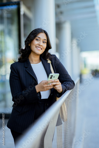 Smiling woman in business a...