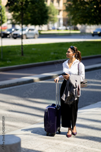 Woman waiting on the street...