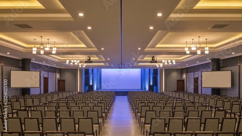 Modern spacious conference hall with cinema seating arrangement