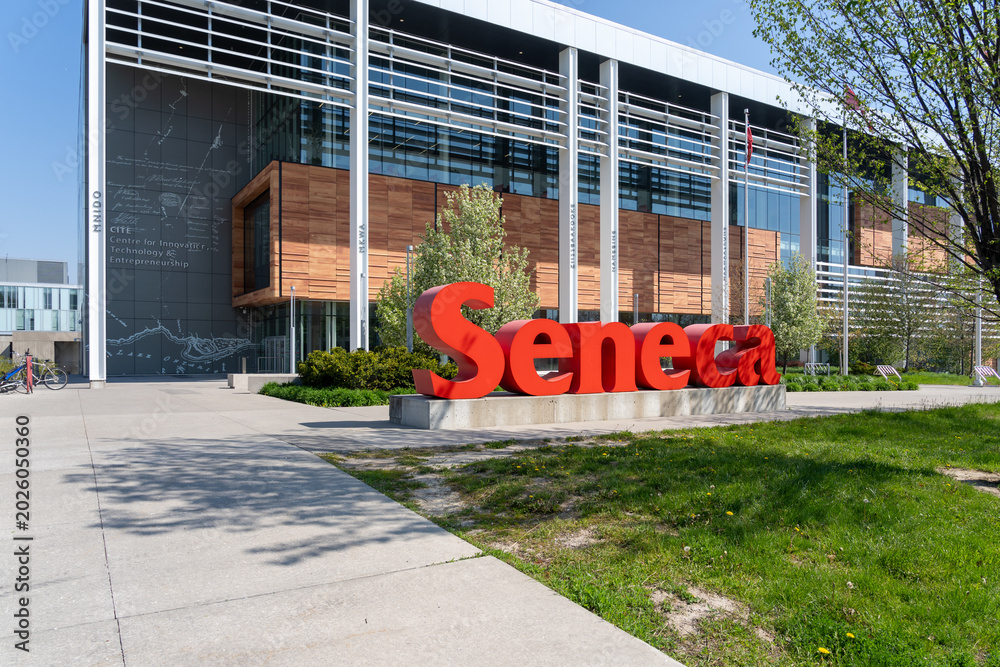 Naklejka premium Toronto, Canada -May 18, 2026: Close up of Seneca sign at Seneca Polytechnic Newnham Campus in Toronto, Canada, in 2026. Seneca College of Applied Arts and Technology, branded as Seneca Polytechnic is