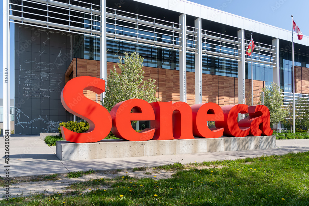 Naklejka premium Toronto, Canada -May 18, 2026: Close up of Seneca sign at Seneca Polytechnic Newnham Campus in Toronto, Canada, in 2026. Seneca College of Applied Arts and Technology, branded as Seneca Polytechnic is