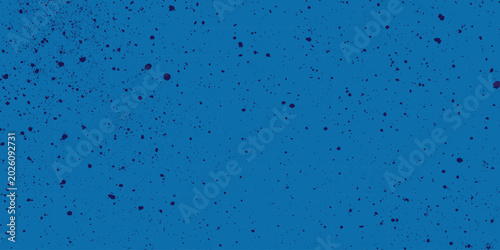 Foto Vibrant blue background with dark blue paint splatters grunge texture