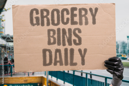 Billede på lærred "Grocery Bins Daily" Retail food outlets discard edible stock every day as a standard practice