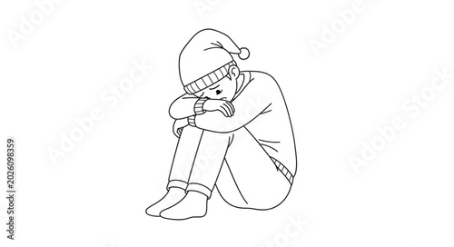 Foto Sad child wearing a nightcap curled up alone.