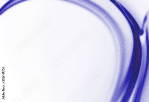 Abstract blue and violet fluid wave light streaks with soft glow for creative background