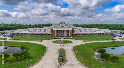 River Parishes Community College Louisiana — Main Building Facade Circular Driveway Fountain Front Aerial Ascension Parish