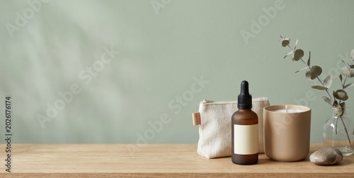 Minimalist Beauty Products and Natural Elements on Wooden Table for Web Design