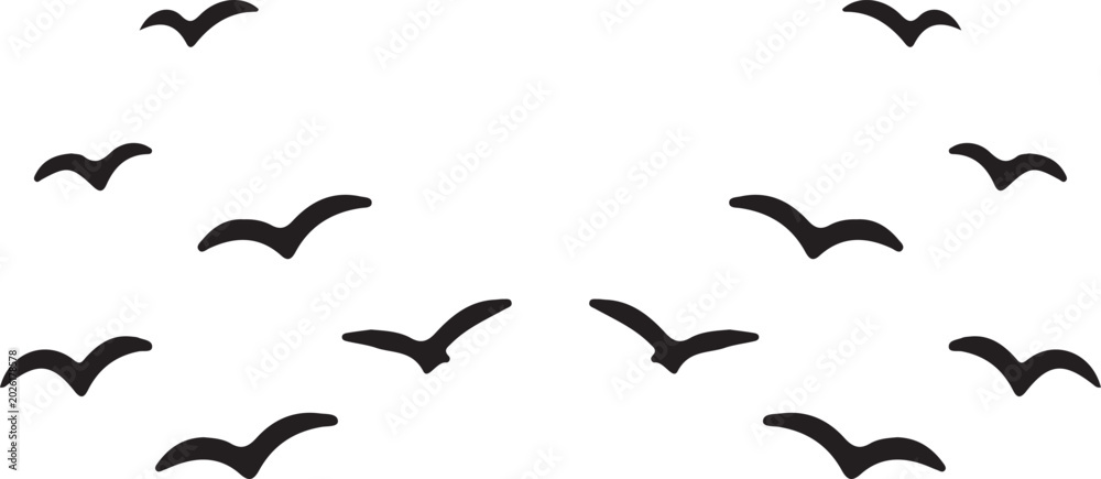 Fototapeta premium Black birds flying in formation